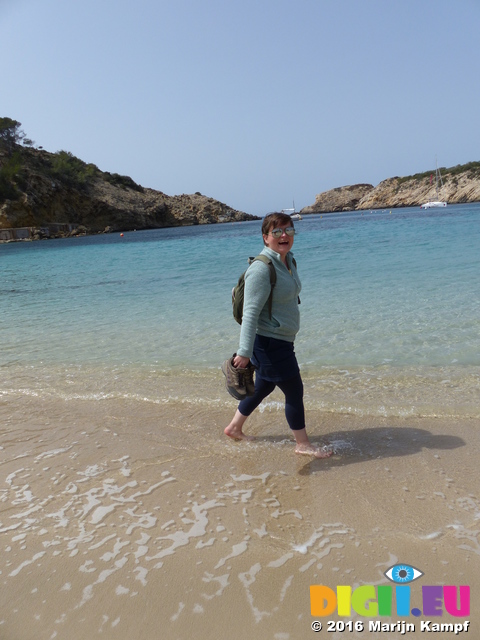 FZ028215 Jenni paddling on Cala Vedella beach